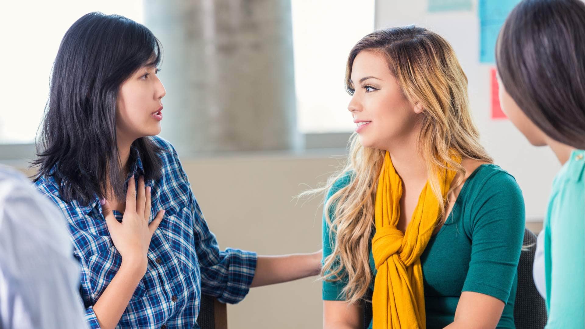 A woman engaging in a supportive clinical session for Addiction and Mental Health Treatment in Highlands Ranch, CO, at Ava Health.