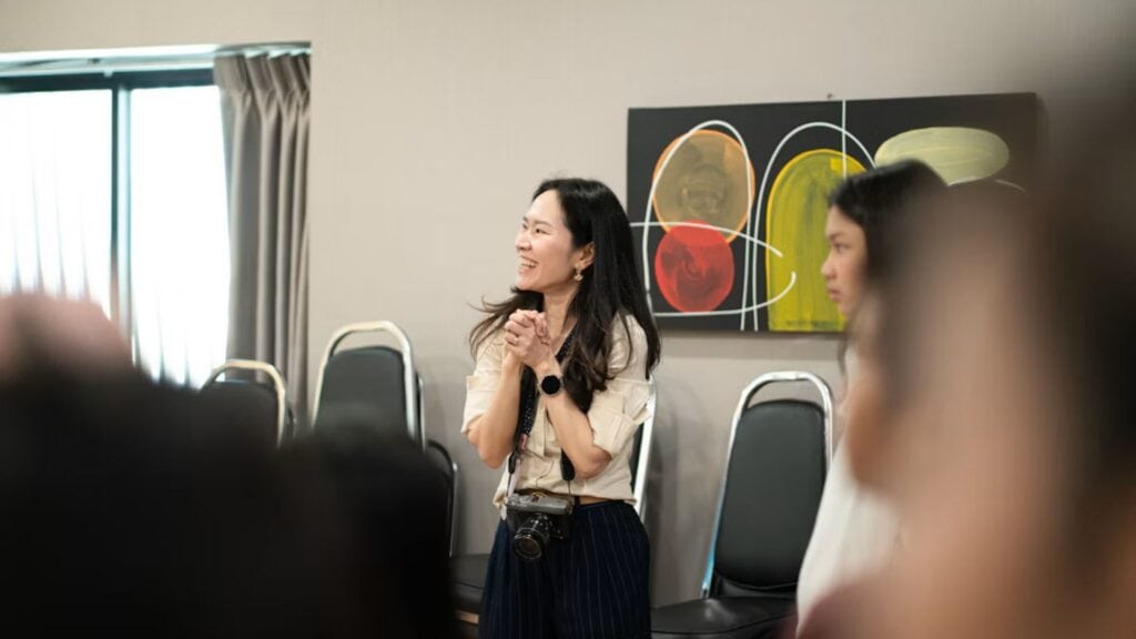 A woman participating happily for an outpatient care after detox